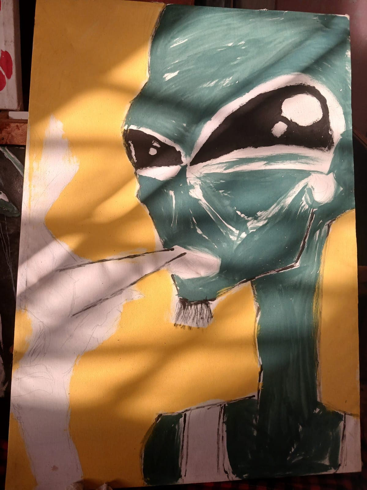 Acrylic painting of a teal-green cat with large black eyes on a yellow background, with areas of raw canvas still visible