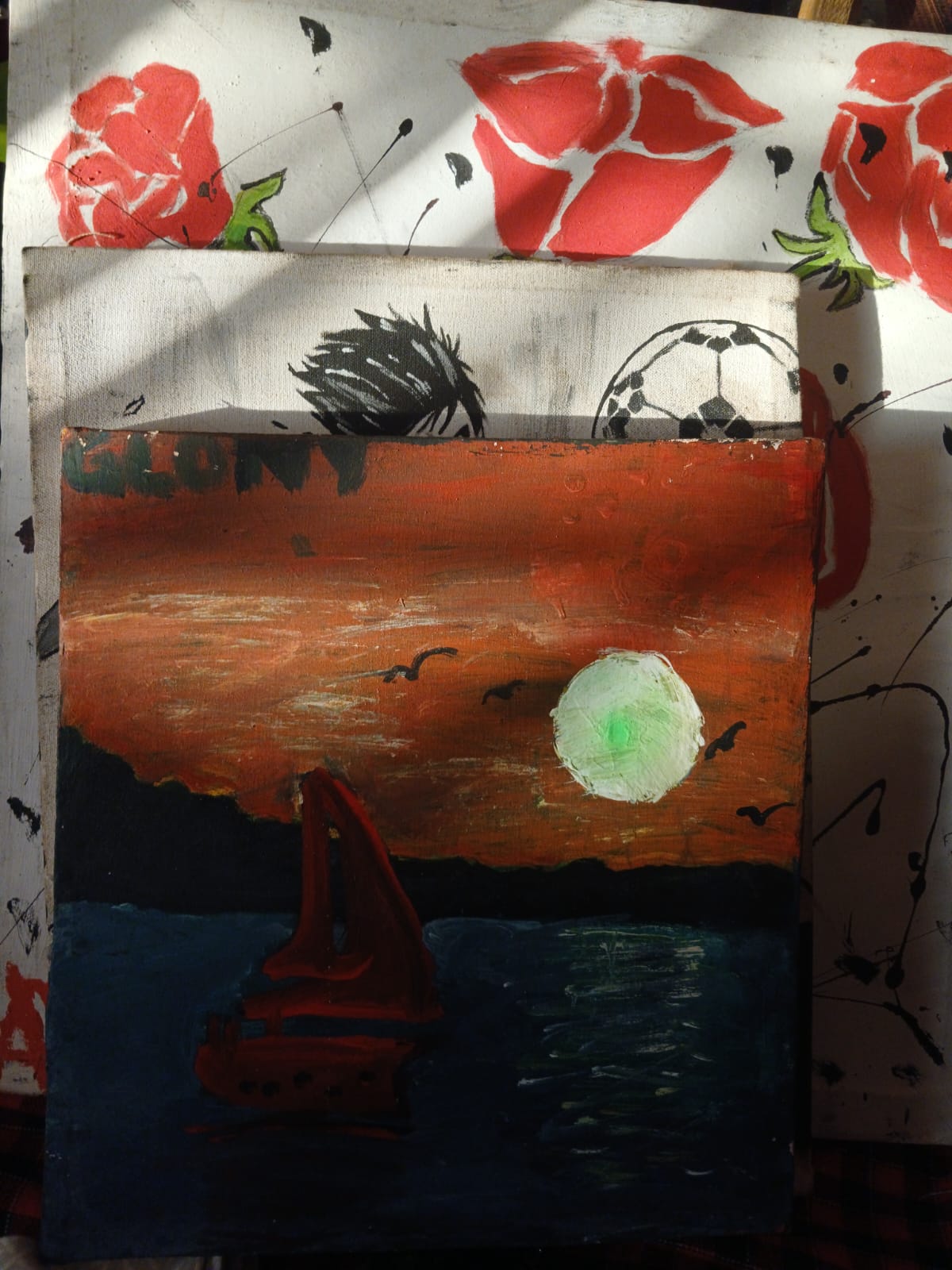 Acrylic painting of a red-sailed boat on dark water under an orange sky and pale green moon, titled Glow