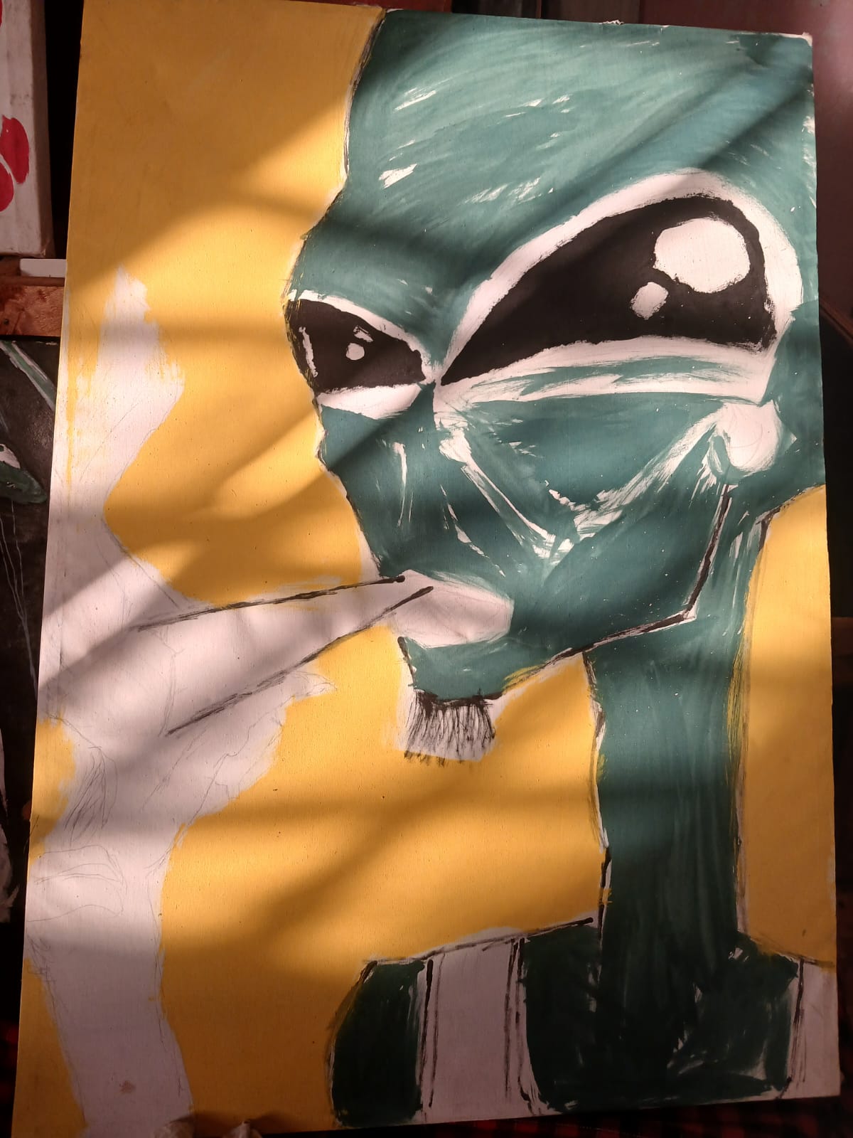 Acrylic painting of a teal-green cat with large black eyes on a yellow background, with areas of raw canvas still visible