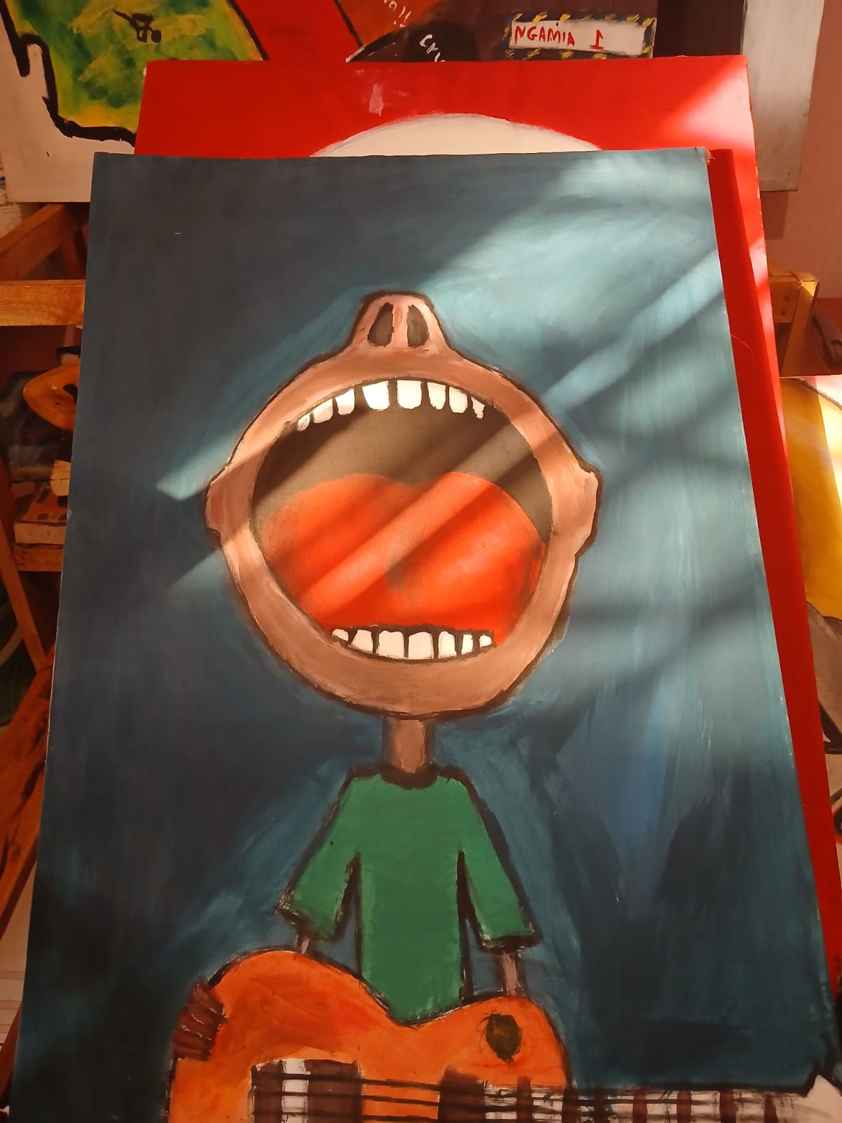 Acrylic painting of a figure in a green shirt singing over an orange guitar against a teal wall