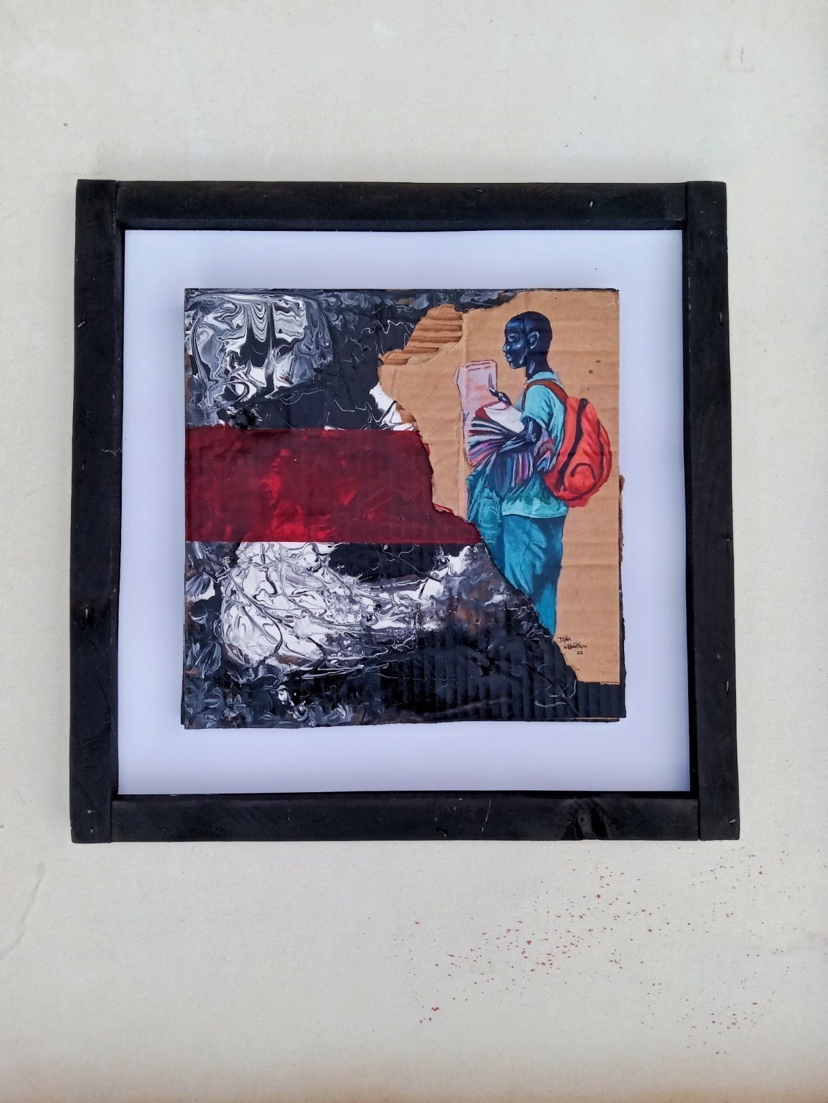 Acrylic painting on torn cardboard of a schoolboy in uniform reading a book, against a black-and-white marbled background with a red band